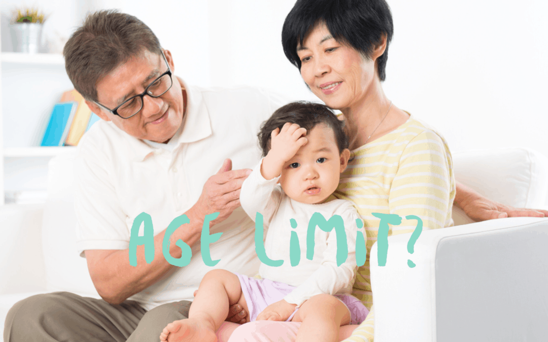 elderly Asian man and woman with a baby and overlay text "Age Limit?"